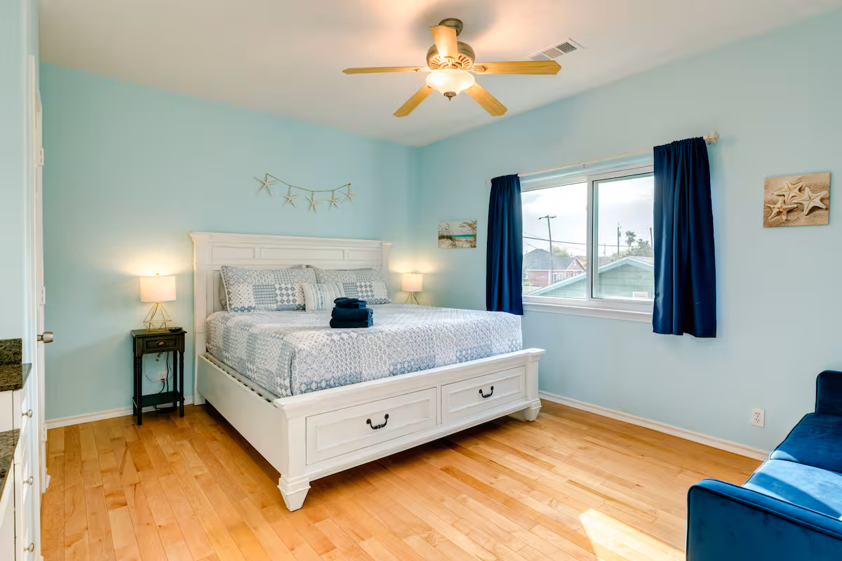 King bedroom with coastal bedding